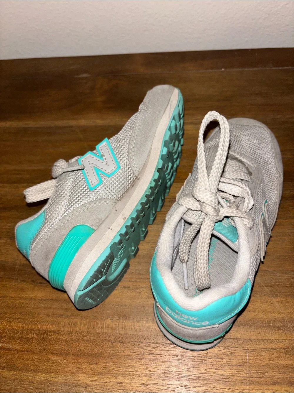 New Balance Kids Gray Sneakers with Teal Accents